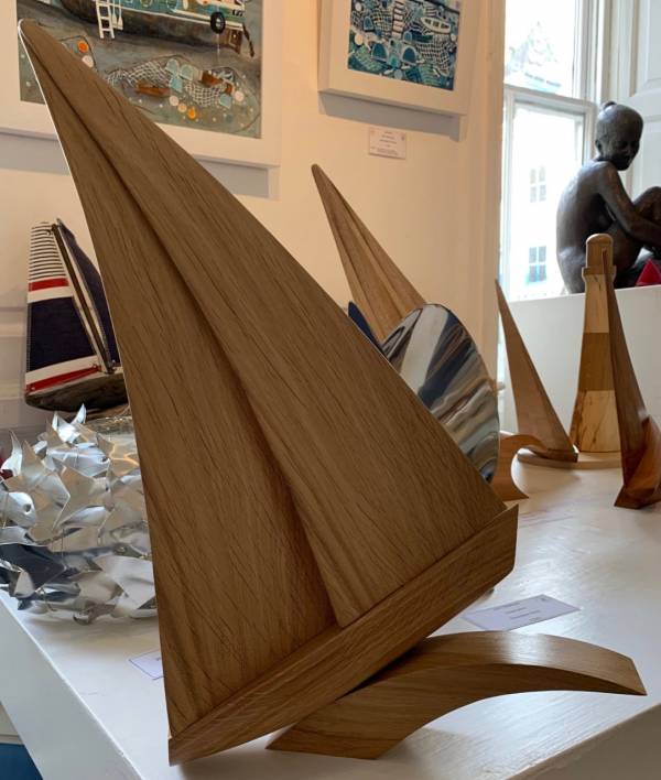 - a , wood Sculpture by Kevin Longstaff, measuring 42 x 25 cm (H x W) £175